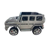Kids_electrice_ride_on_g-Class_5XL_mercedes_self_driven_or_remote_controlled_Kids_battery_operated_car-white_iglide_AMG_kids_battery_operated_sit_in_car_children_metallic_silver